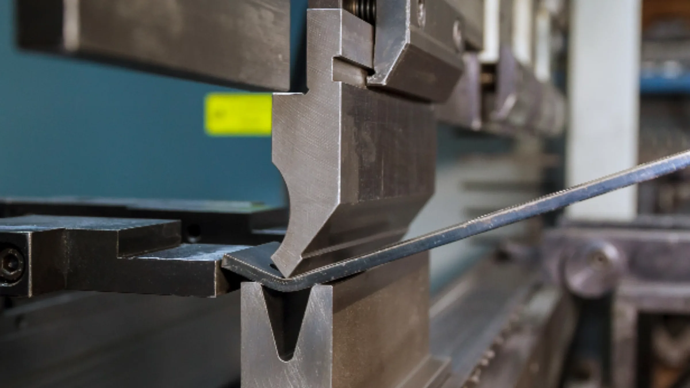 Press brake forming a sheet-metal profile
